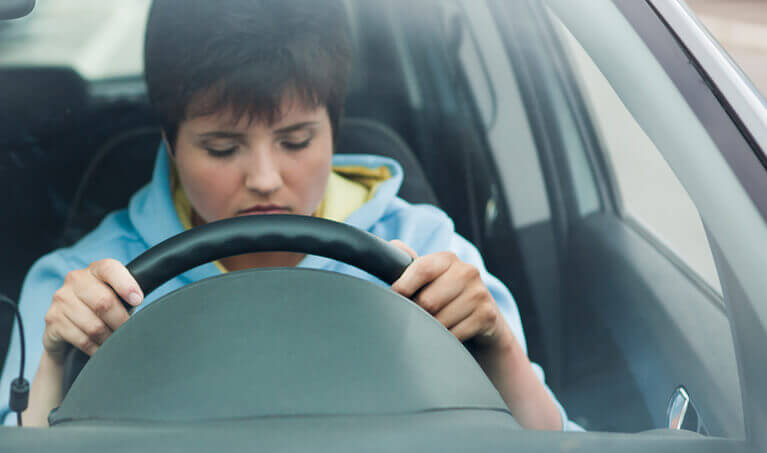 Driver falling asleep behind the wheel