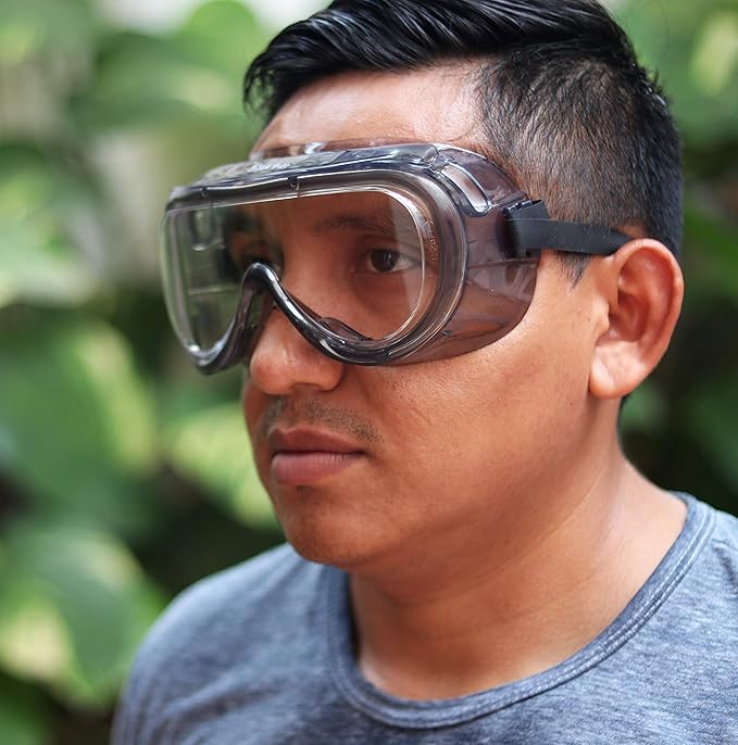 Worker wearing Encon 160 Series Indirect-Vent Goggle 2-59 Clear Anti-Fog Lens