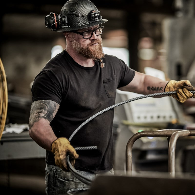 Man in a hard hat and yellow gloves wearing Wiley X Epic prescription safety glasses.