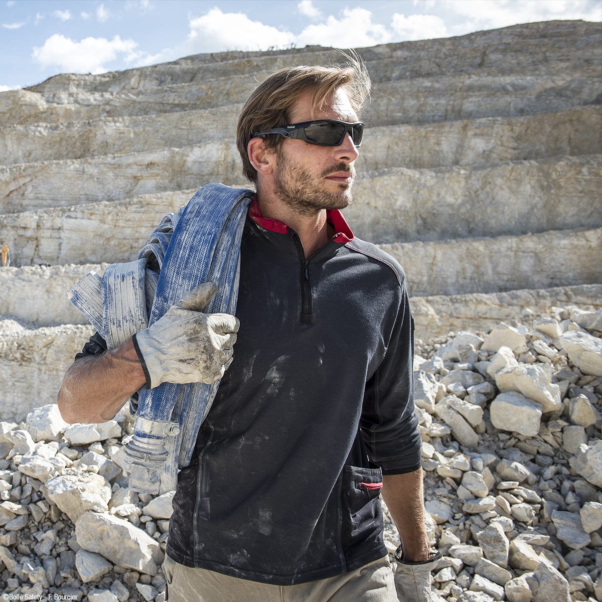 Bolle Mercuro Safety Glasses with Polarized Smoke Lens worn on the jobsite
