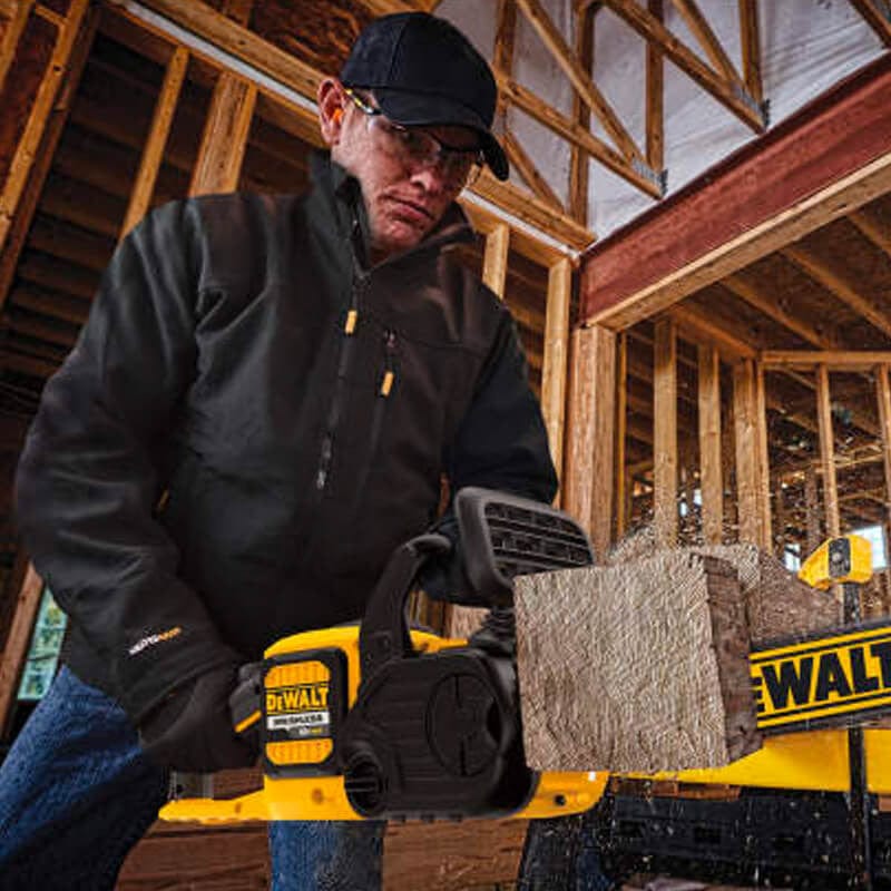 DEWALT Unisex Heated Soft Shell Jacket Black With Battery & Charger - Man Wearing While Working