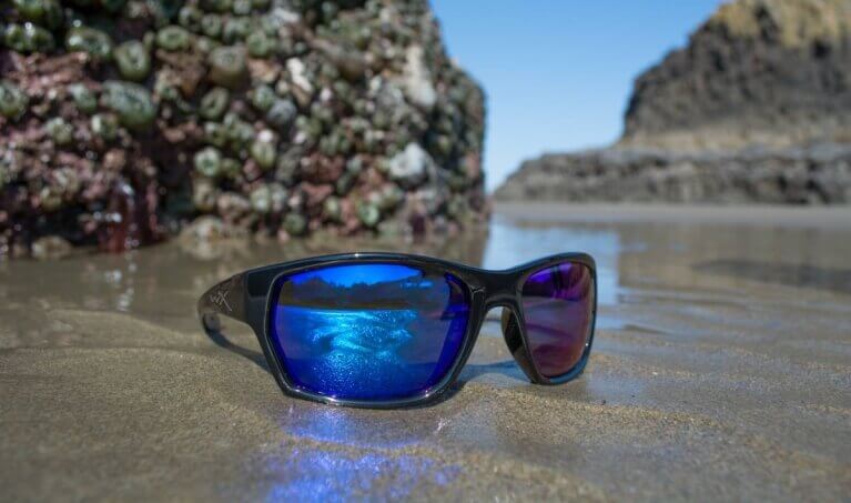 Wiley X Sunglasses laying on the sand