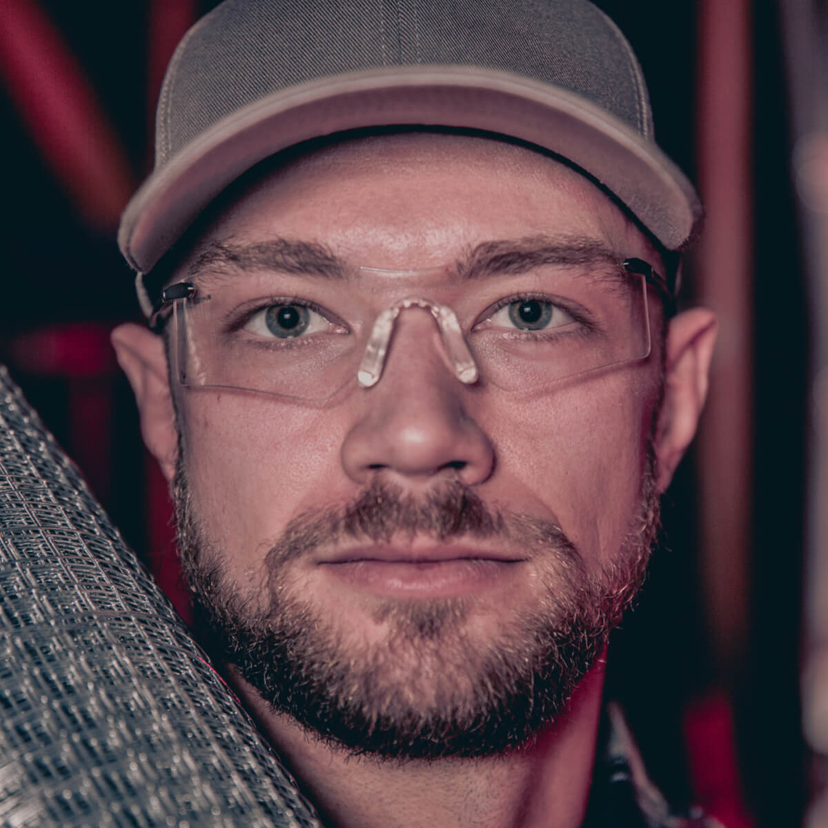 MCR Safety T4110AF Rubicon T4 Safety Glasses with Clear Lens worn by worker 2