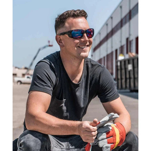 Worker wearing EnChroma Summit Color Blind Safety Glasses with Outdoor Protan Lenses